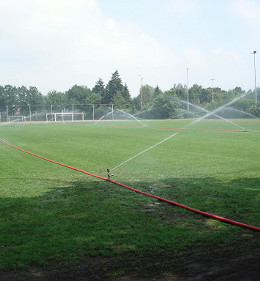 Above-ground sprinklers and de-ironing system